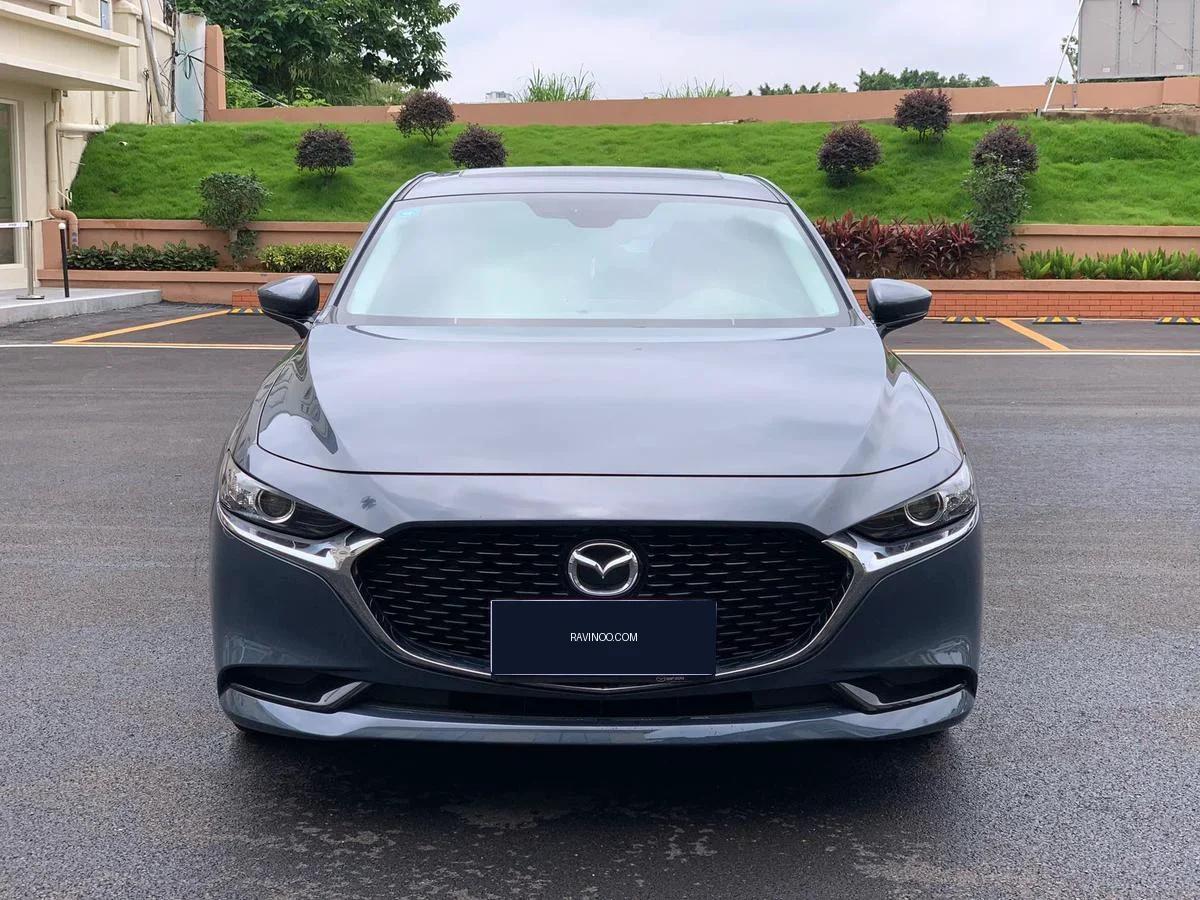 2024 Mazda Axela — photo 1