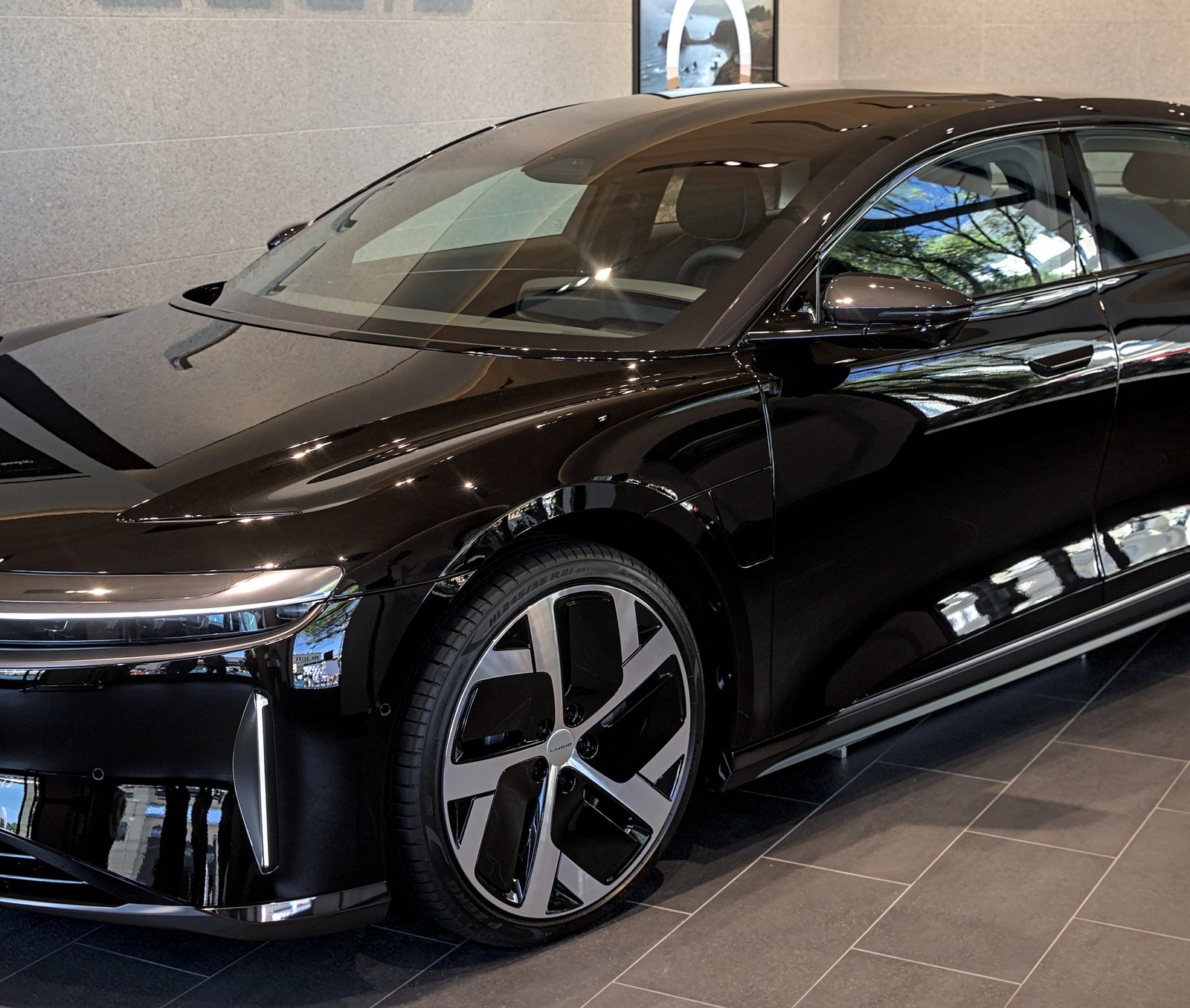 Front three-quarter view of a car on the showroom floor